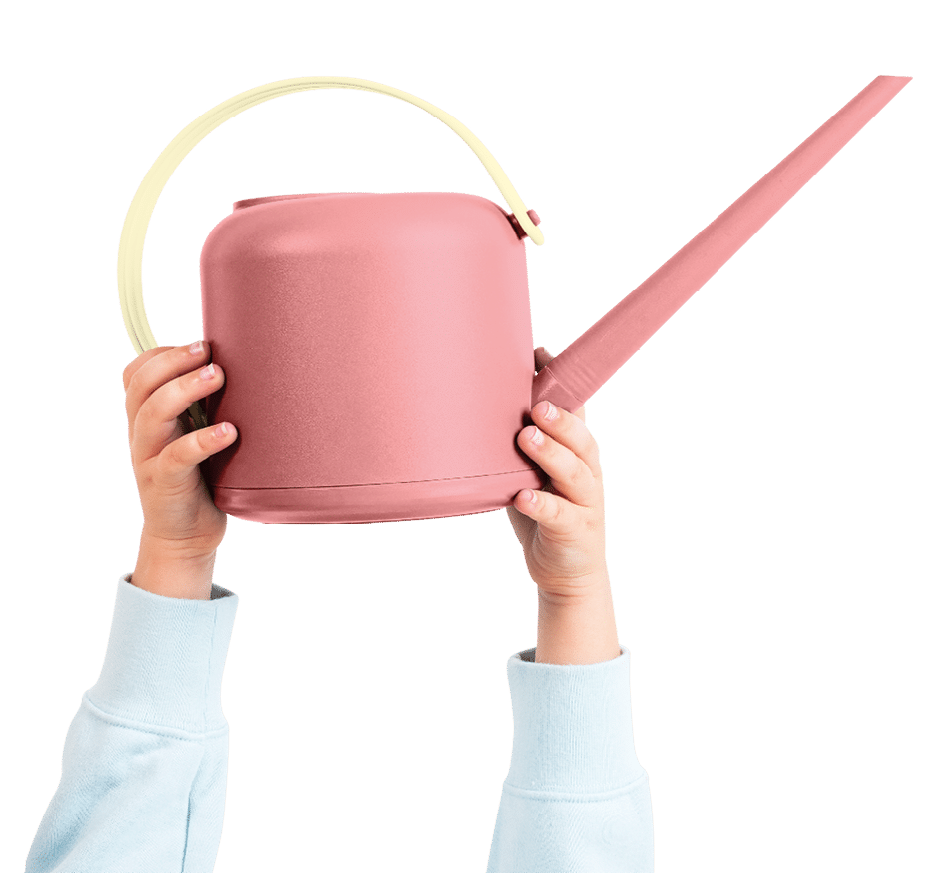 Png hand mockup holding pink watering can gardening tool