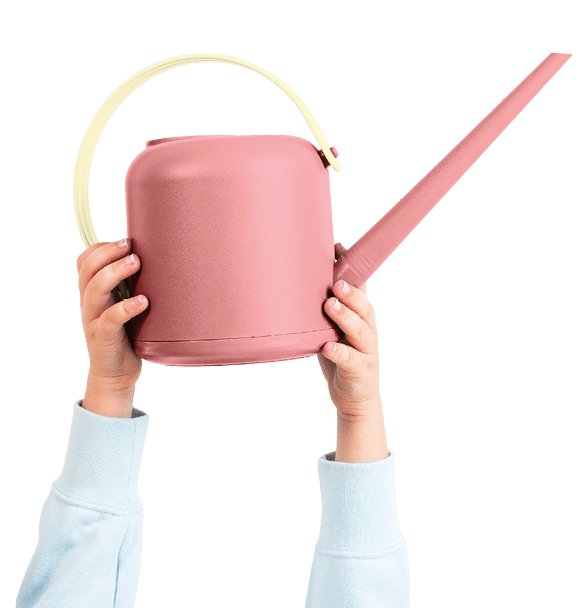Png hand mockup holding pink watering can gardening tool